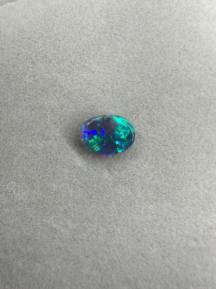 1.2ct Solid Black Opal – Blau - Grünes Farbspiel, Oval - Masterpiece Opals Store