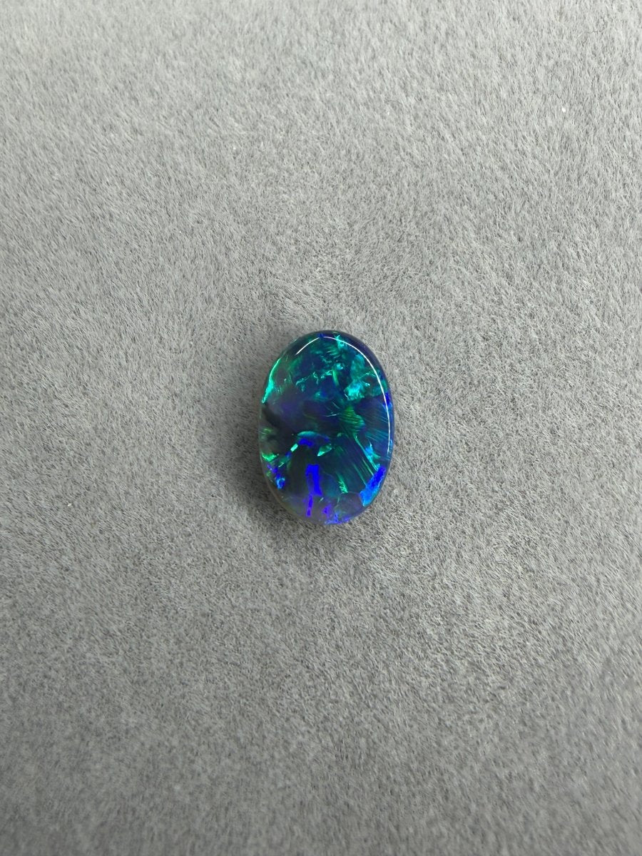 1.2ct Solid Black Opal – Blau - Grünes Farbspiel, Oval - Masterpiece Opals Store