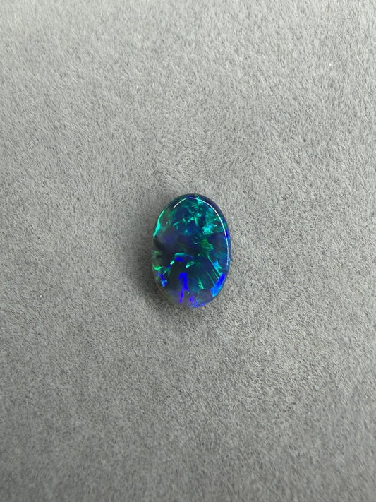 1.2ct Solid Black Opal – Blau - Grünes Farbspiel, Oval - Masterpiece Opals Store